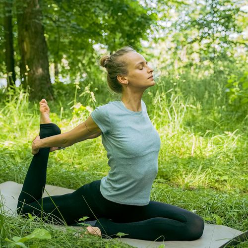 Person feeling energetic and balanced in a nature setting.